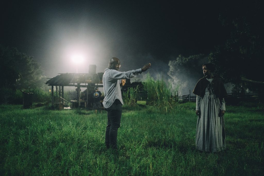 Barry Jenkins directs Thuso Mbedu in a scene from The Underground Railroad.