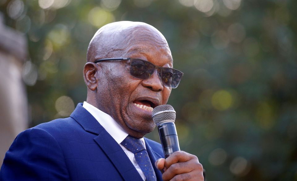 South Africa's former President Jacob Zuma, who faces fraud and corruption charges, speaks to supporters after appearing at the High Court in Pietermaritzburg, South Africa, May 17, 2021. REUTERS/Rogan Ward/File Photo