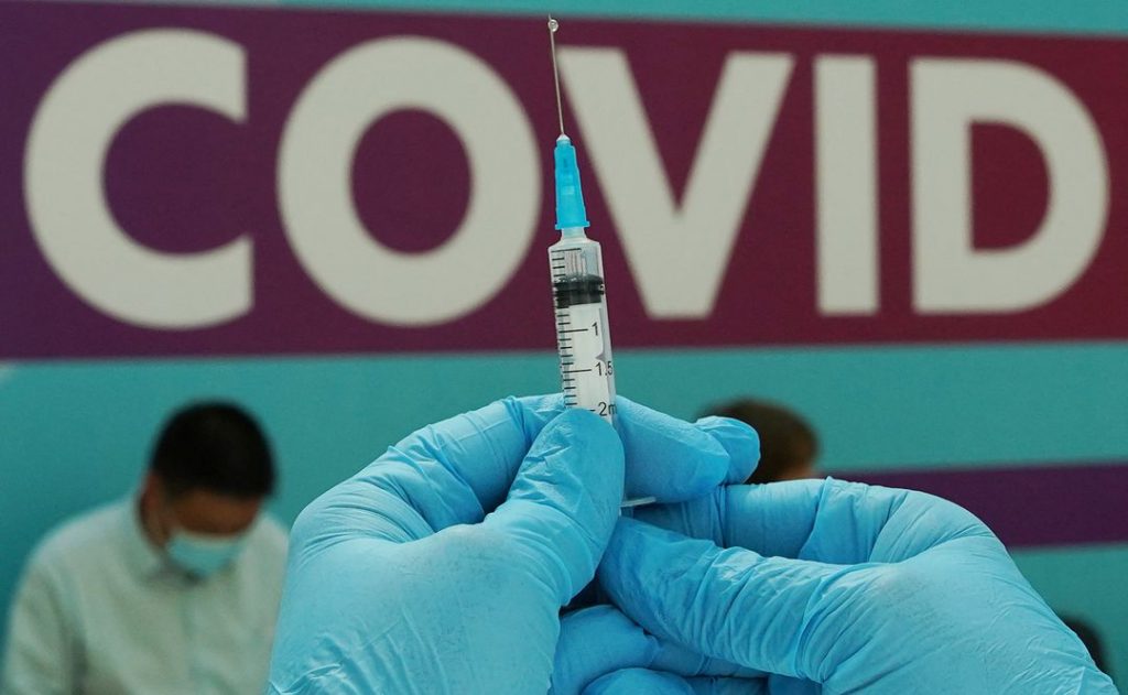 A healthcare worker prepares a dose of Sputnik V (Gam-COVID-Vac) vaccine against the coronavirus disease (COVID-19) at a vaccination centre in Gostiny Dvor in Moscow, Russia July 6, 2021. REUTERS/Tatyana Makeyeva