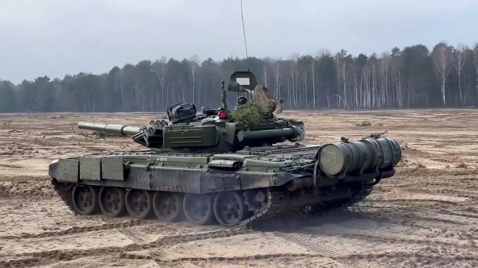 A tank drives during the Union Courage 2022 joint military exercise of the armed forces of Russia and Belarus, at the Brestsky training ground in Brest Region, Belarus, in this still image taken from video released February 11, 2022. Russian Defence Ministry/Handout via REUTERS